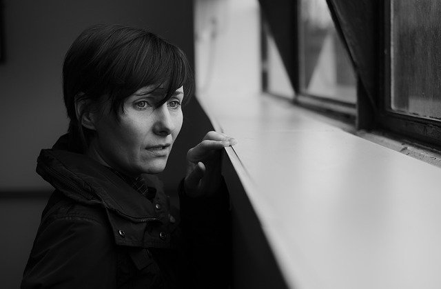 Woman coping with the loss of a loved one.